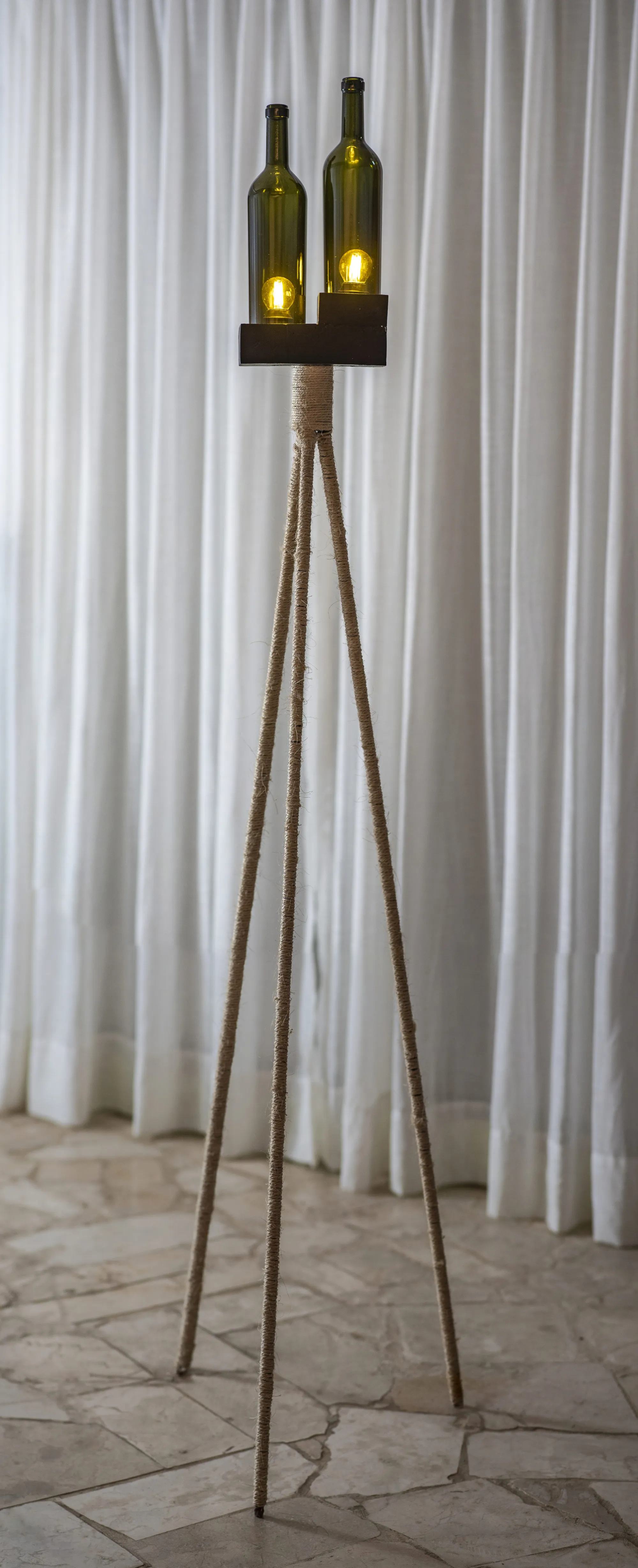 A Luz Verde lamp made from recycled bottles